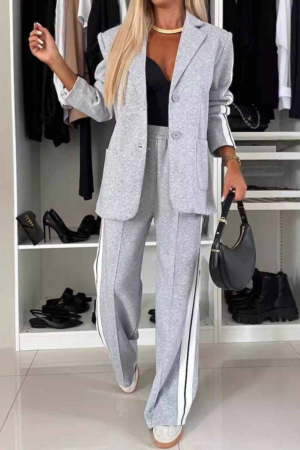 BELLA Trendsi full size contrast lapel collar top and pants set, featuring a stylish lapel collar and coordinated matching outfit.