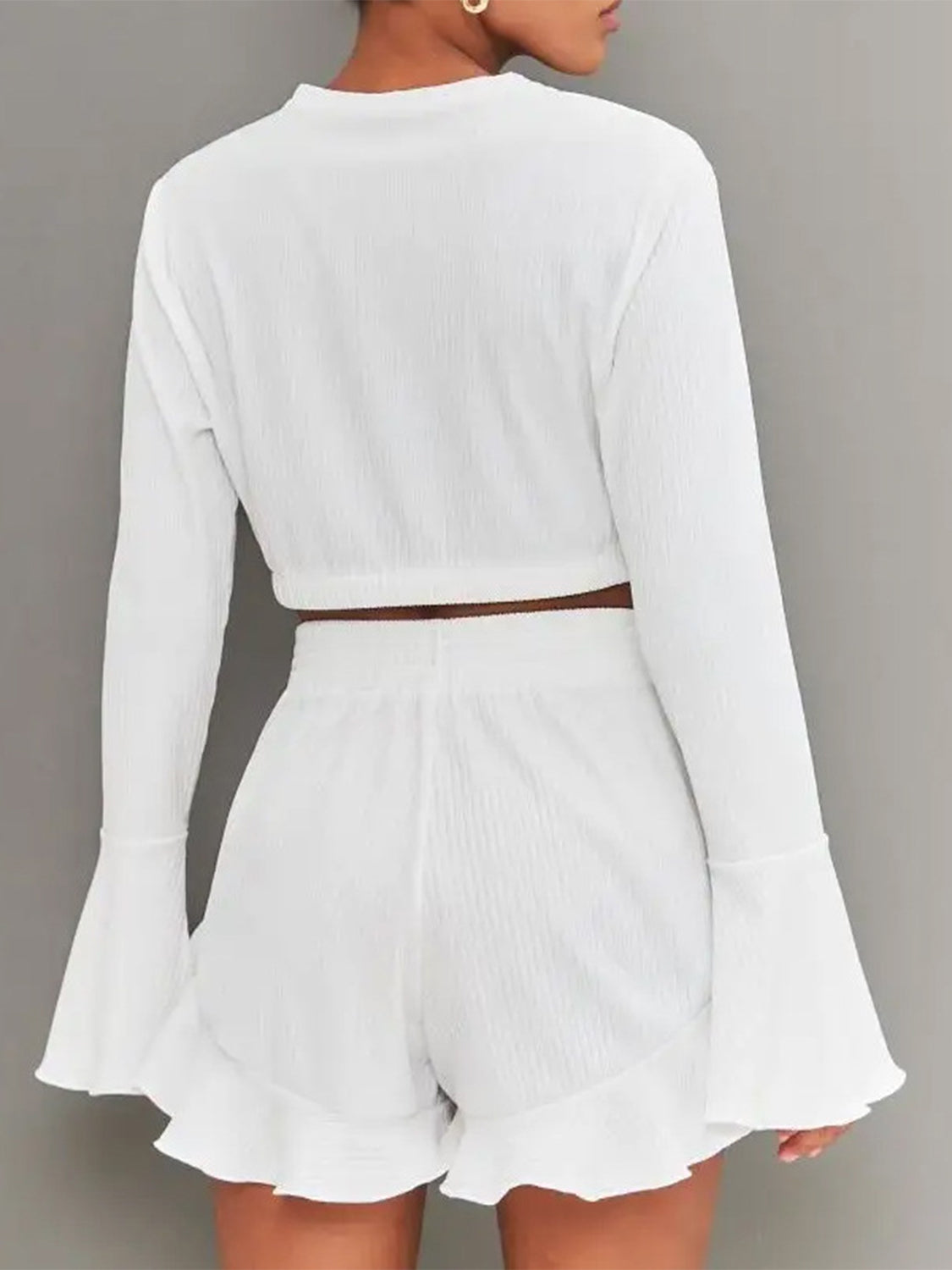 BELLA Trendsi round neck long sleeve top and ruffled shorts set, stylish casual outfit, soft fabric, perfect for warm weather.
