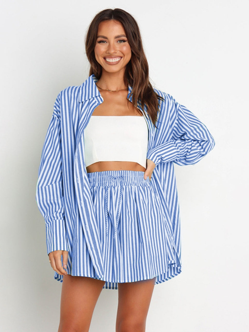 BELLA striped dropped shoulder shirt and shorts set featuring a casual, trendy style with bold vertical stripes and relaxed fit.