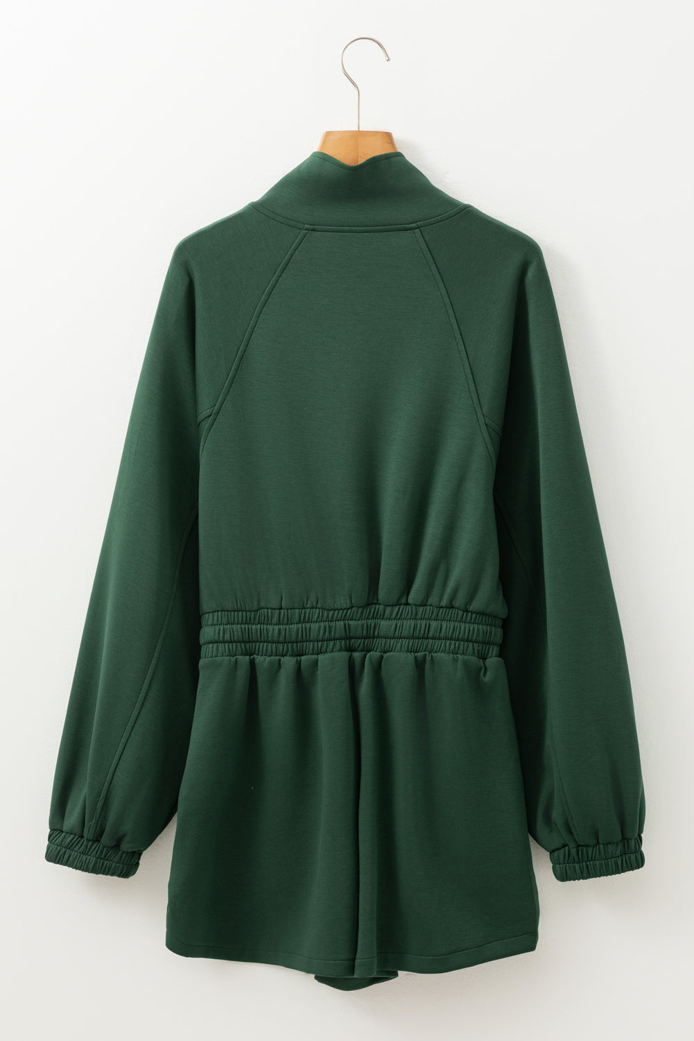BELLA trendsi drawstring half zip long sleeve romper featuring a relaxed fit and casual style, shown in a neutral color.