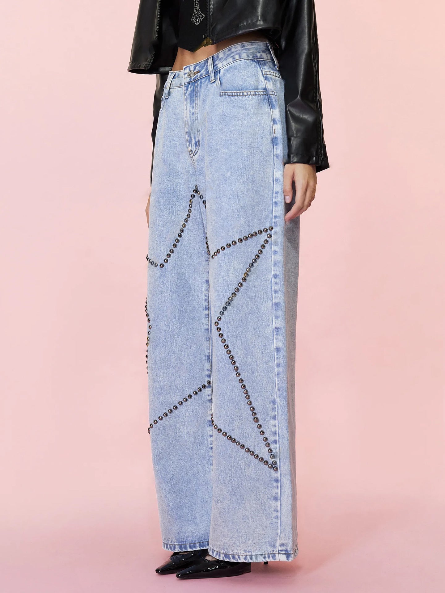 BELLA Studded Star Straight Jeans with pockets, featuring metal studs and classic five-pocket design, shown on a model.