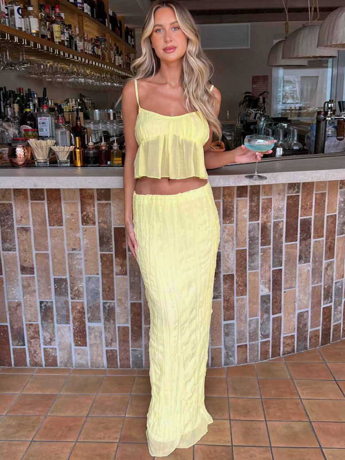 BELLA trendsi square neck sleeveless top and ruched skirt set in a matching fabric, shown on a model.