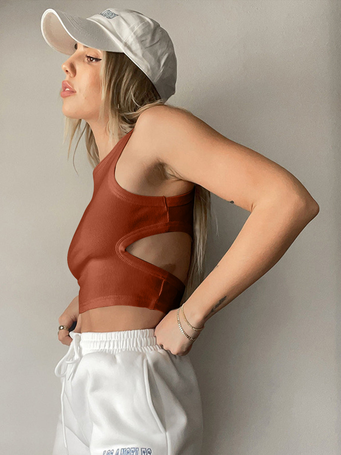 Bella BLA Cutout Round Neck Tank top, trendy sleeveless blouse with cutout details, in a round neckline style.