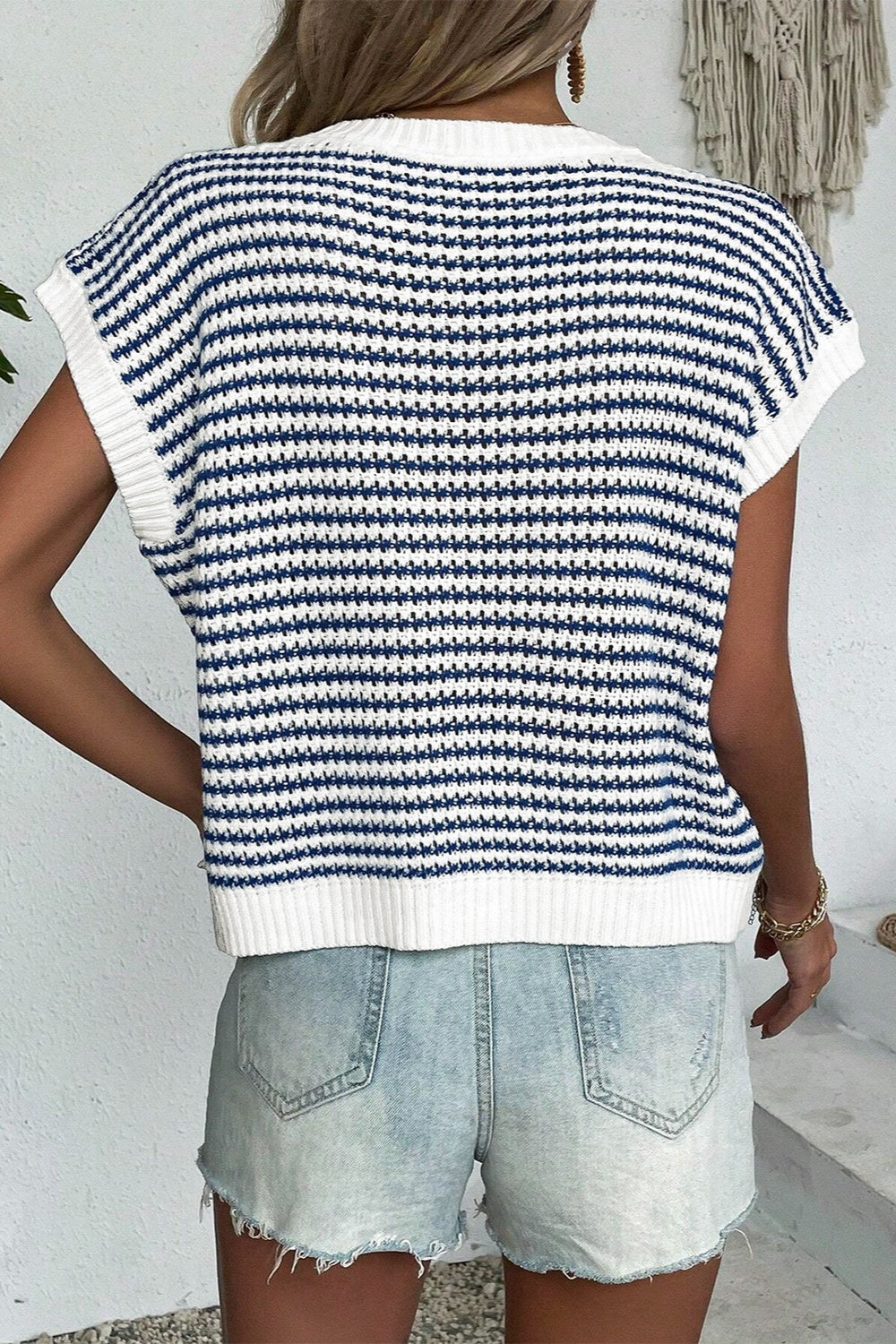 BELLA striped round neck sweater vest from trendsi, featuring colorful horizontal stripes and a cozy knit fabric.