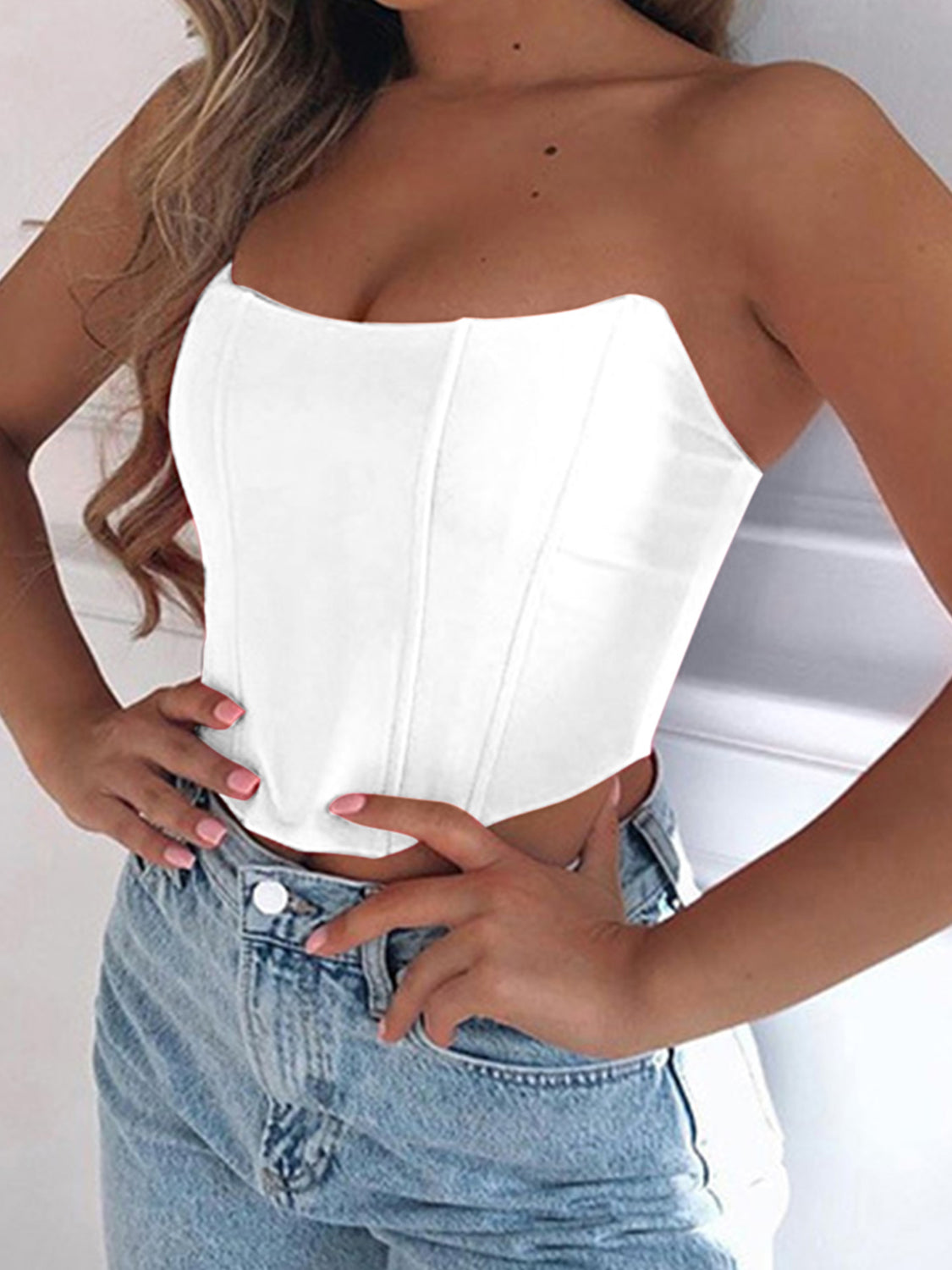 BELLA Tube Cropped Top from Trendsi, featuring a fitted design, in black with a sleek neckline, shown on a model.