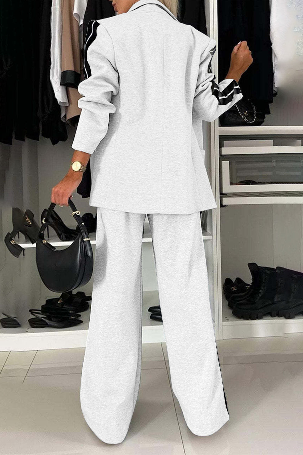 BELLA Trendsi full size contrast lapel collar top and pants set, featuring stylish matching pieces and tailored design.