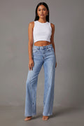 BELLA high waist straight jeans with front and back pockets, made from denim fabric, displayed on a neutral background.