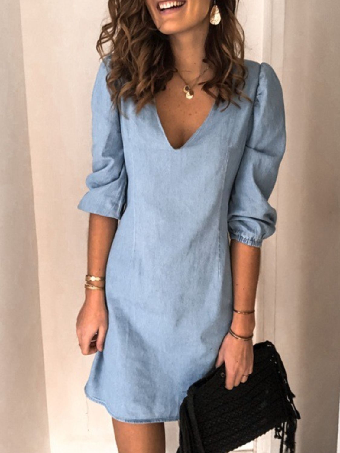 BELLA trendsi full size V-neck half sleeve dress in soft fabric, shown on a model with a relaxed fit and stylish design.