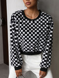 BELLA plaid round neck long sleeve sweater with a classic check pattern, casual and cozy for everyday wear.