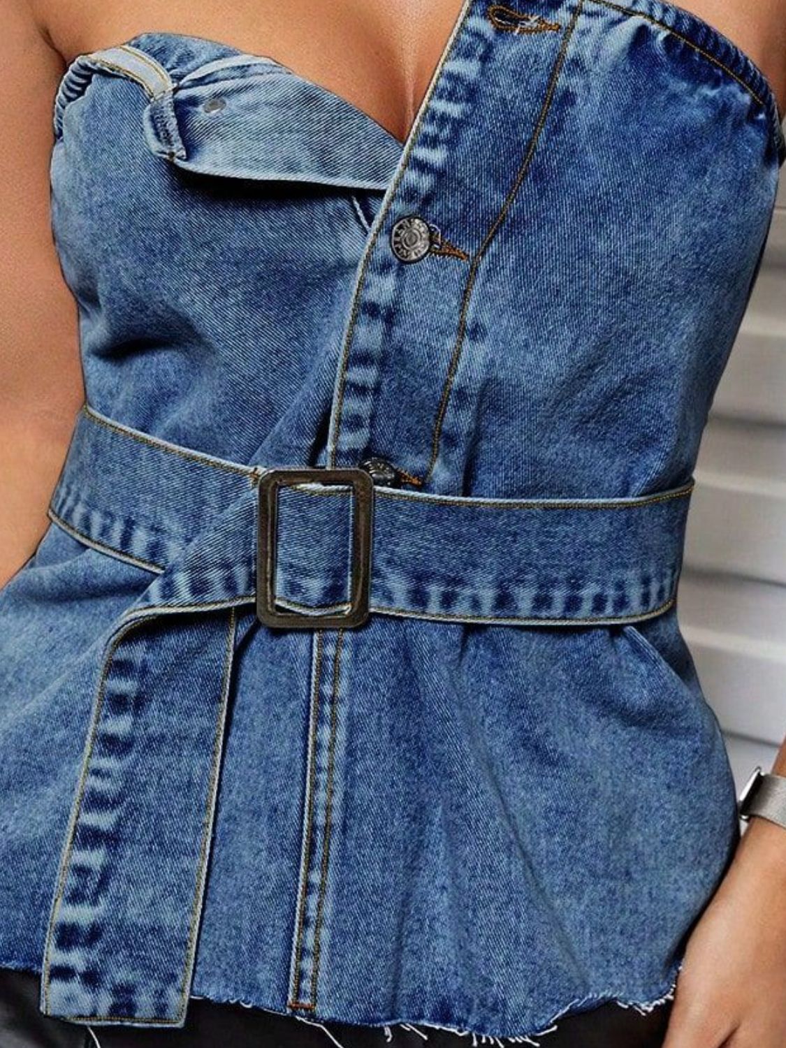 Buttoned raw hem denim tube top by BELLA BLA featuring a fitted design, front buttons, and casual raw hem detail.