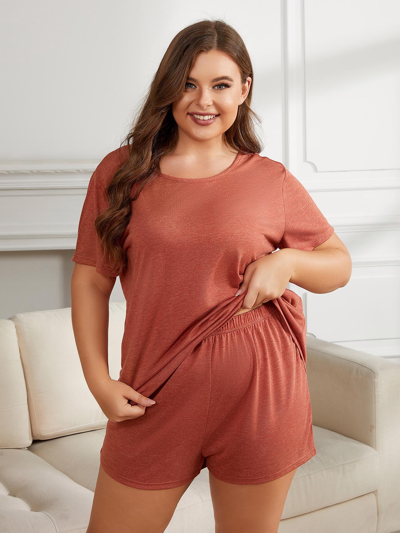 Plus size two-piece loungewear set by BELLA featuring comfortable matching top and bottoms in soft fabric.