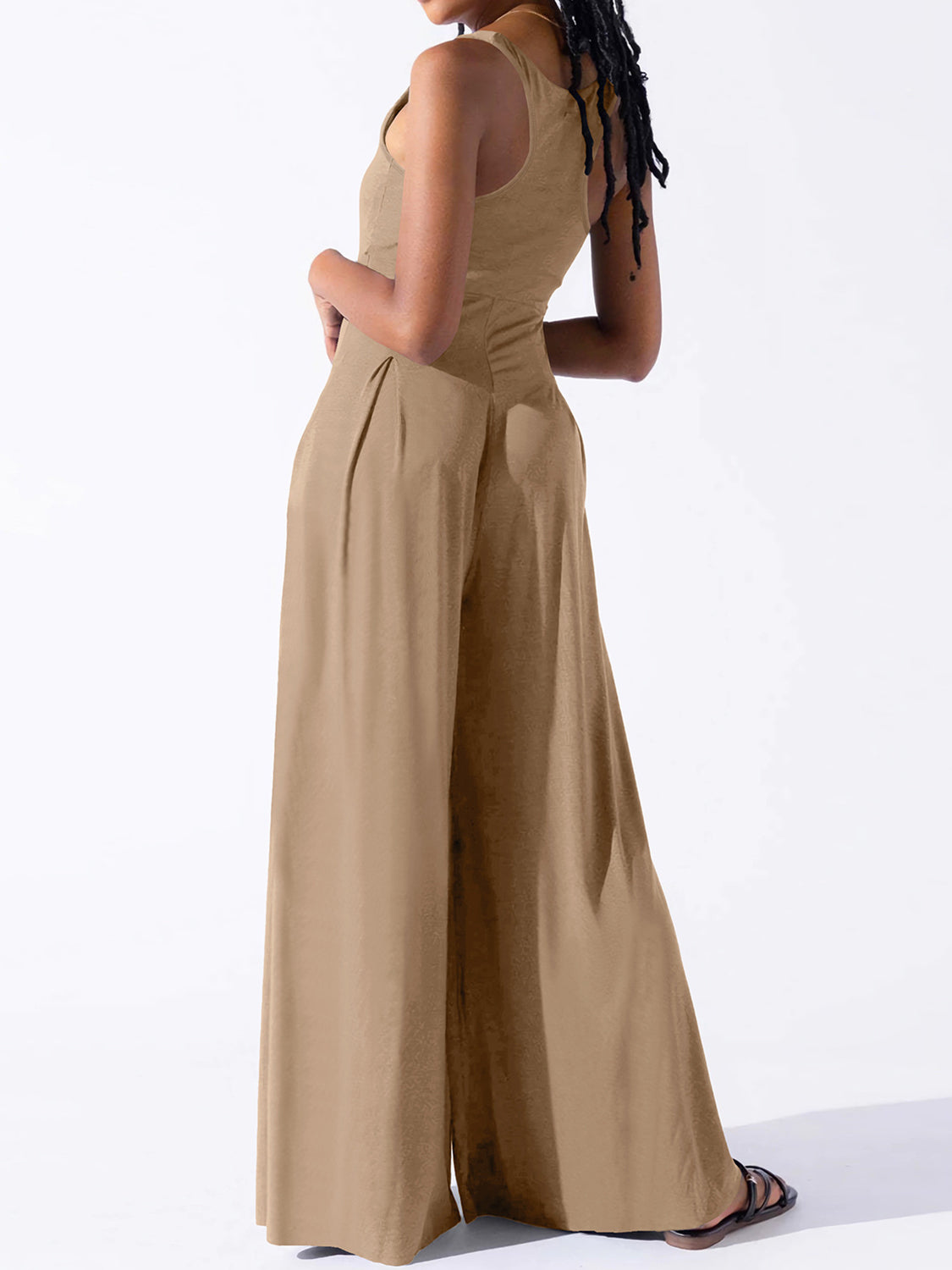 BELLA trendsi square neck wide strap jumpsuit featuring a fitted bodice and wide leg pants, shown on a model.