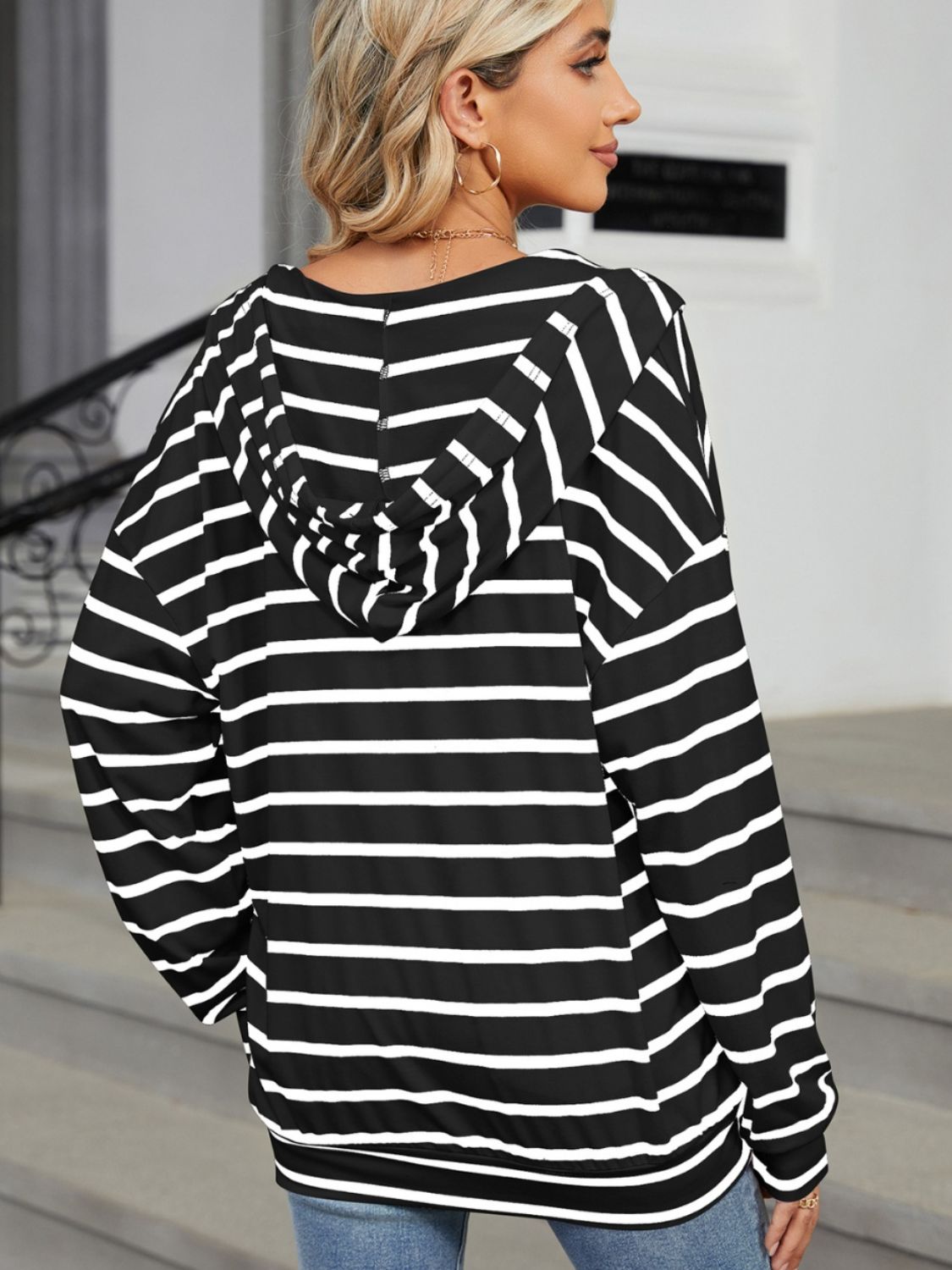 Bella Bla drawstring striped long sleeve hoodie with a relaxed fit, featuring a hood, adjustable drawstrings, and bold stripe pattern.