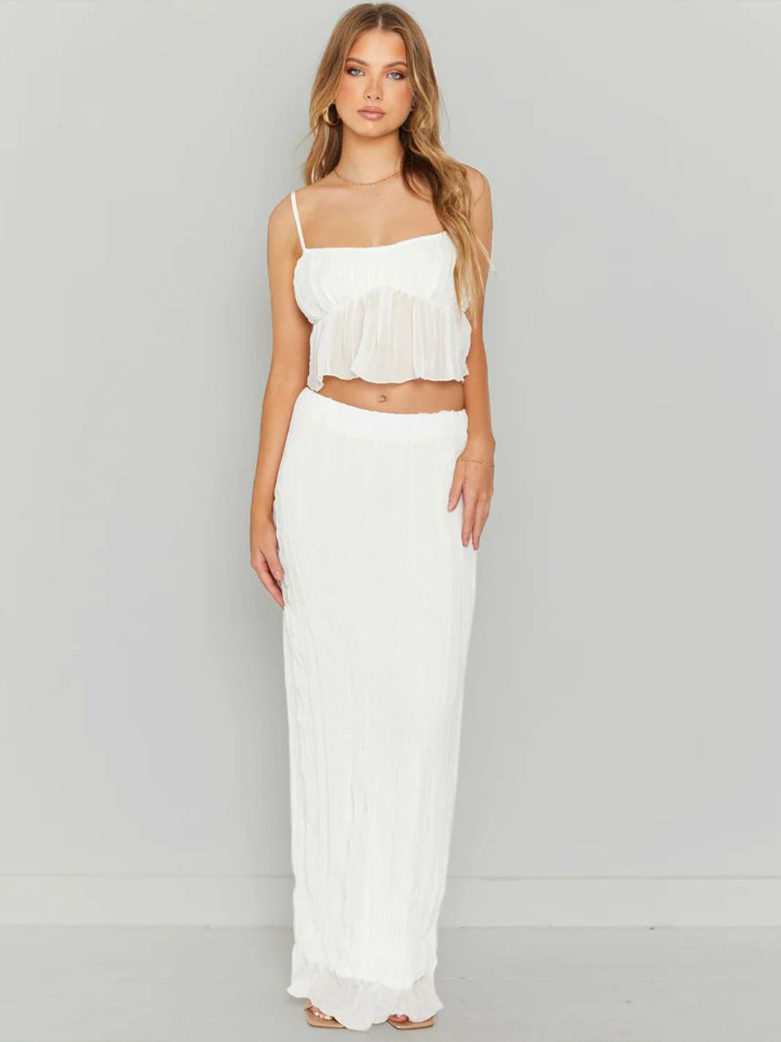 BELLA trendsi square neck sleeveless top and ruched skirt set, showcasing a stylish, coordinated outfit with a modern design.