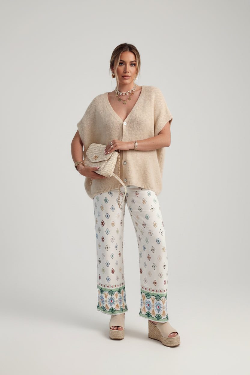 BELLA V-Neck Button Up Short Sleeve Cardigan, trendy knitwear with buttons, in a casual and stylish design.