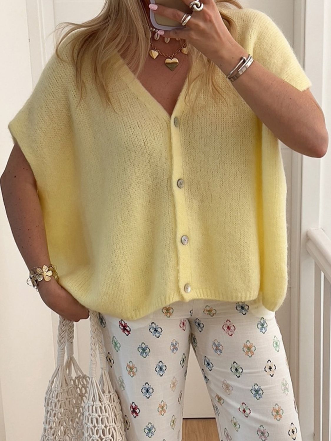 BELLA V-neck button-up short sleeve cardigan from trendsi, displayed in a neutral color with a fitted design.