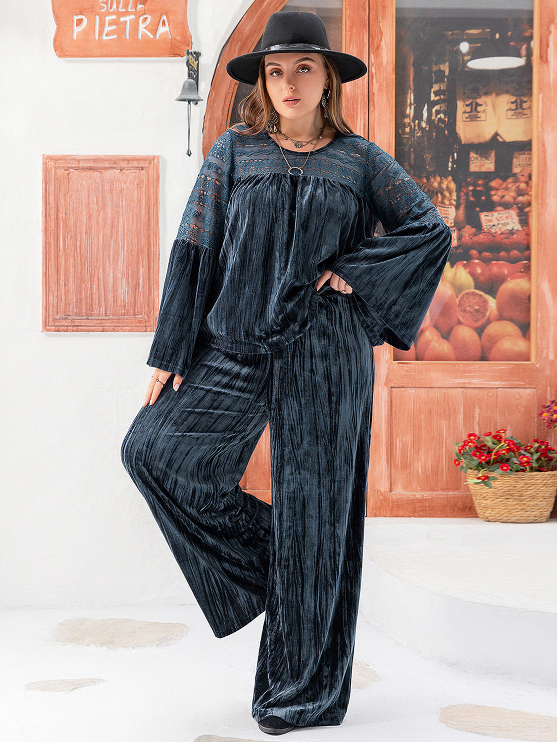 Plus size BELLA flare sleeve top and matching pants set featuring a round neckline, stylish and comfortable for everyday wear.
