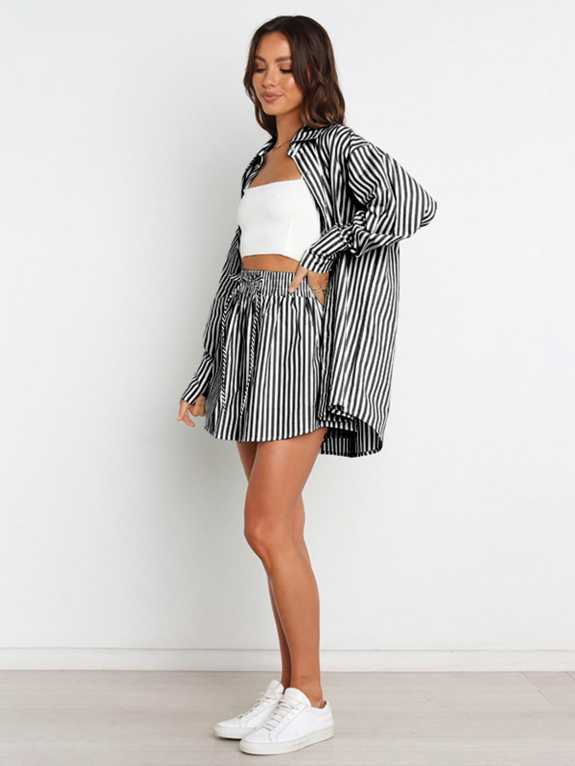 BELLA striped dropped shoulder shirt and shorts set from trendsi, featuring a stylish, casual look with bold stripes and relaxed fit.