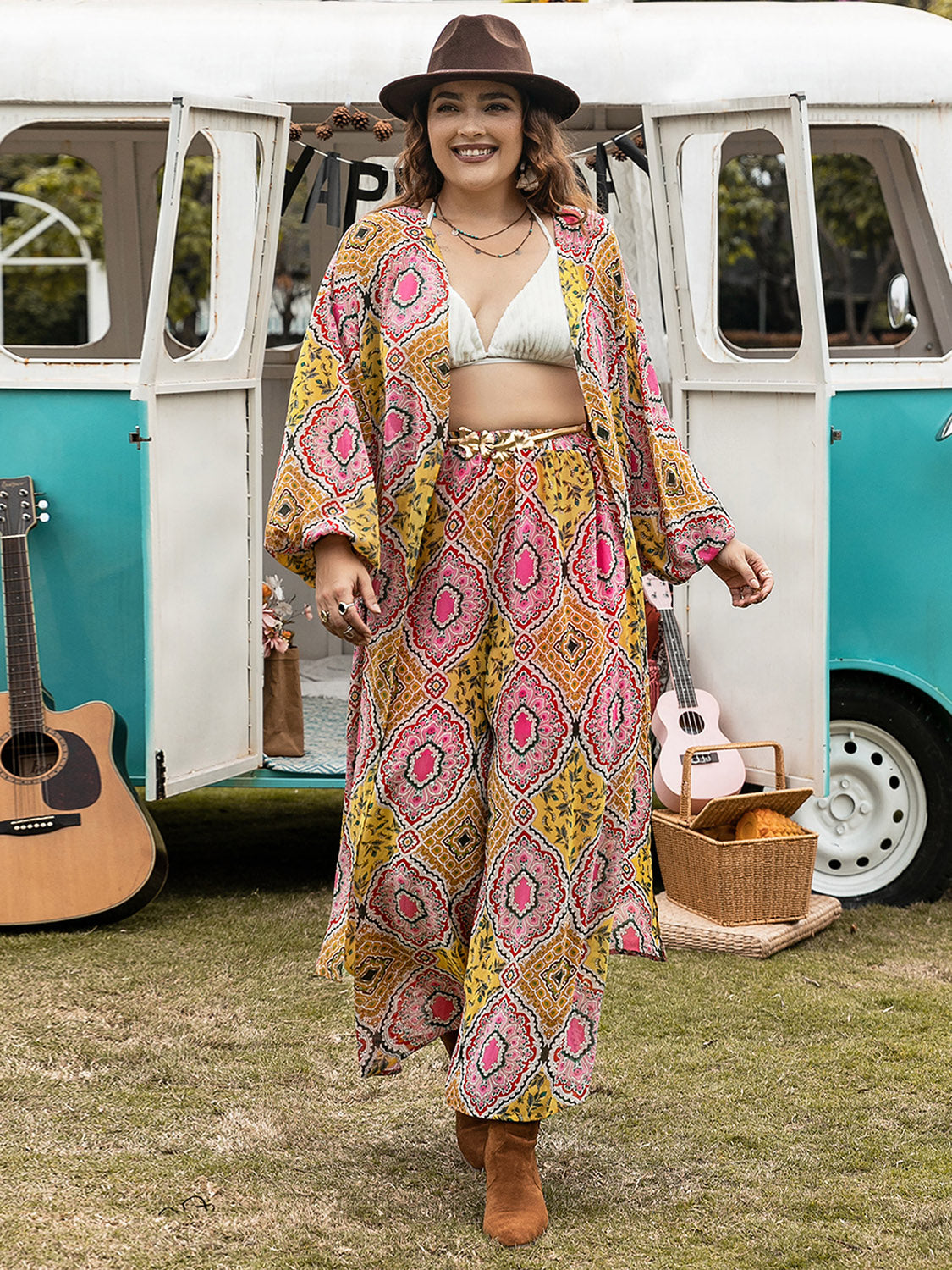 Plus size printed open front cover-up and pants set by BELLA, featuring a stylish pattern and comfortable fit.