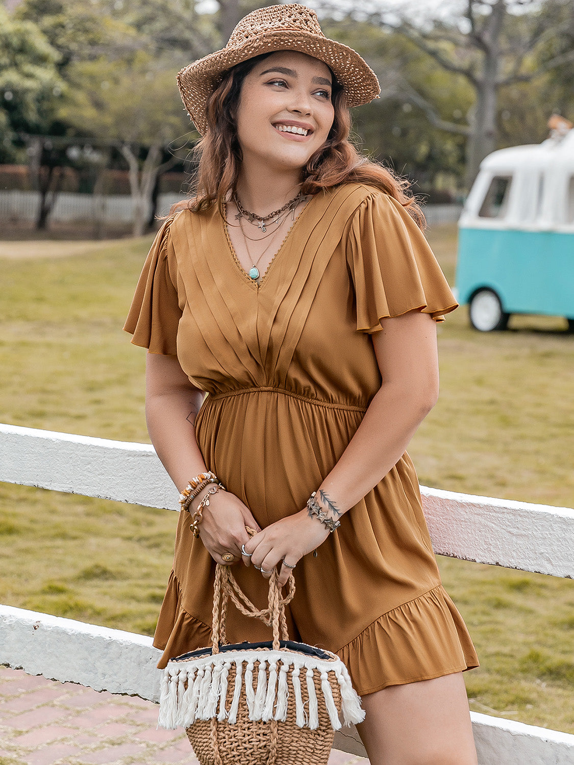 Plus size BELLA ruffled V-neck short sleeve romper, stylish trendy jumpsuit with feminine ruffle details and comfortable fit.