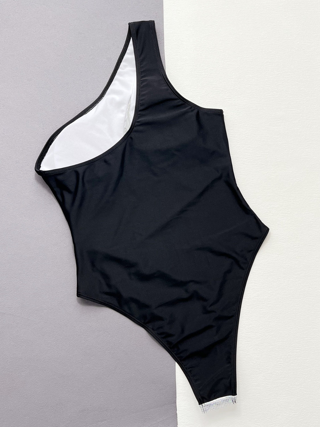 Contrast panel one-piece swimsuit by BELLA BLA featuring stylish design and vibrant color blocking, perfect for beach or pool.