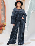 Plus size Bella Trendsi round neck flare sleeve top and pants set, featuring a stylish coordinated outfit with a relaxed fit.
