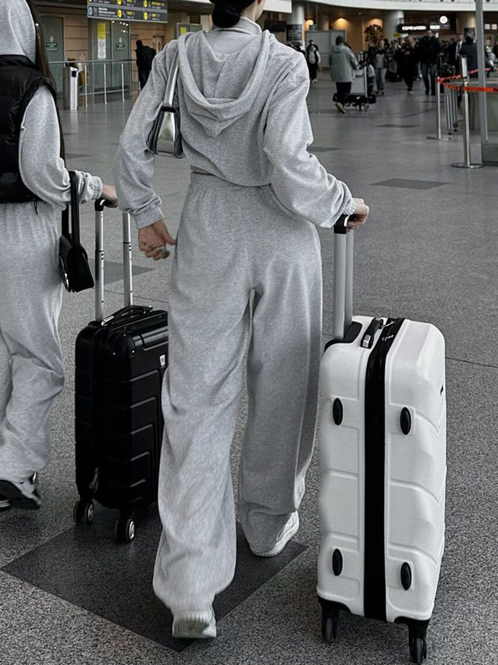 BELLA BLA zip-up hoodie and pocketed pants set, featuring a casual, comfortable fit with front pockets and a trendy style.