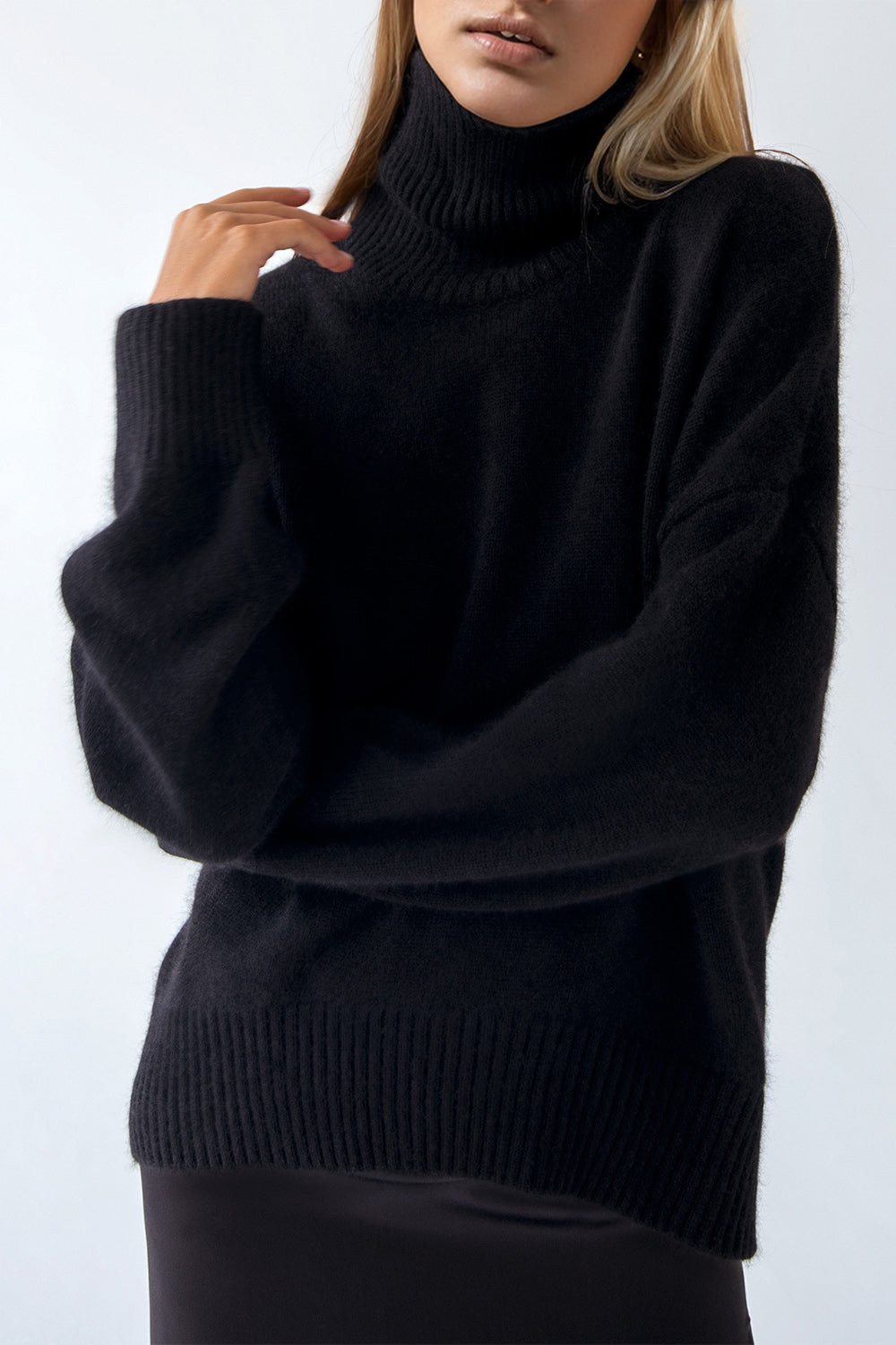 Bella BLA turtleneck dropped shoulder long sleeve sweater in soft knit, featuring a relaxed fit and stylish design.