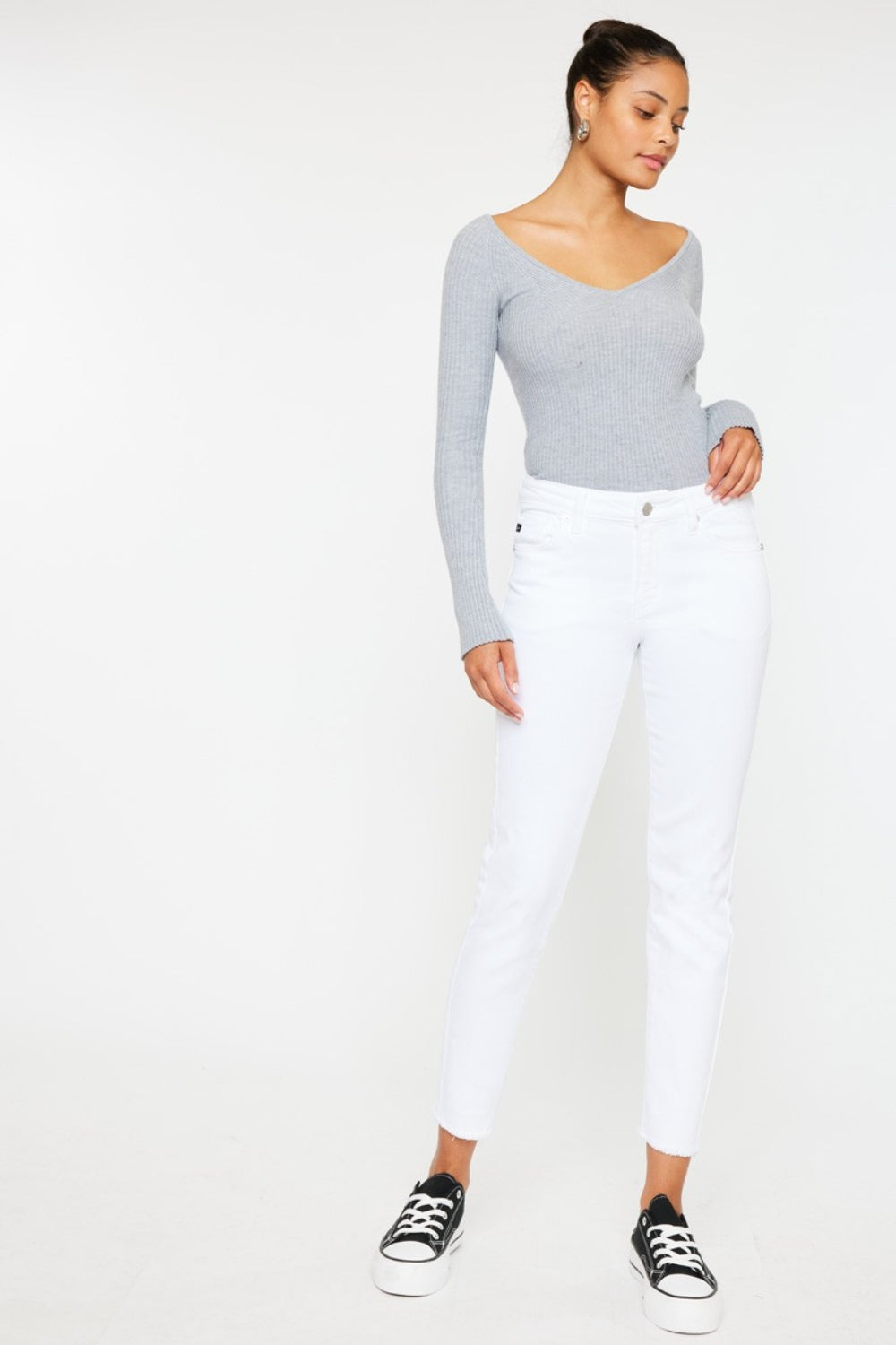 BELLA Kancan mid-rise ankle skinny jeans in classic denim, showing fit and style on a model with front pockets and rolled cuffs.