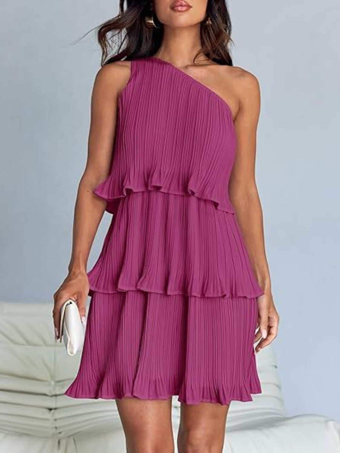 BELLA layered single shoulder mini dress from trendsi, featuring a stylish asymmetric design and elegant fabric in a close-up view.
