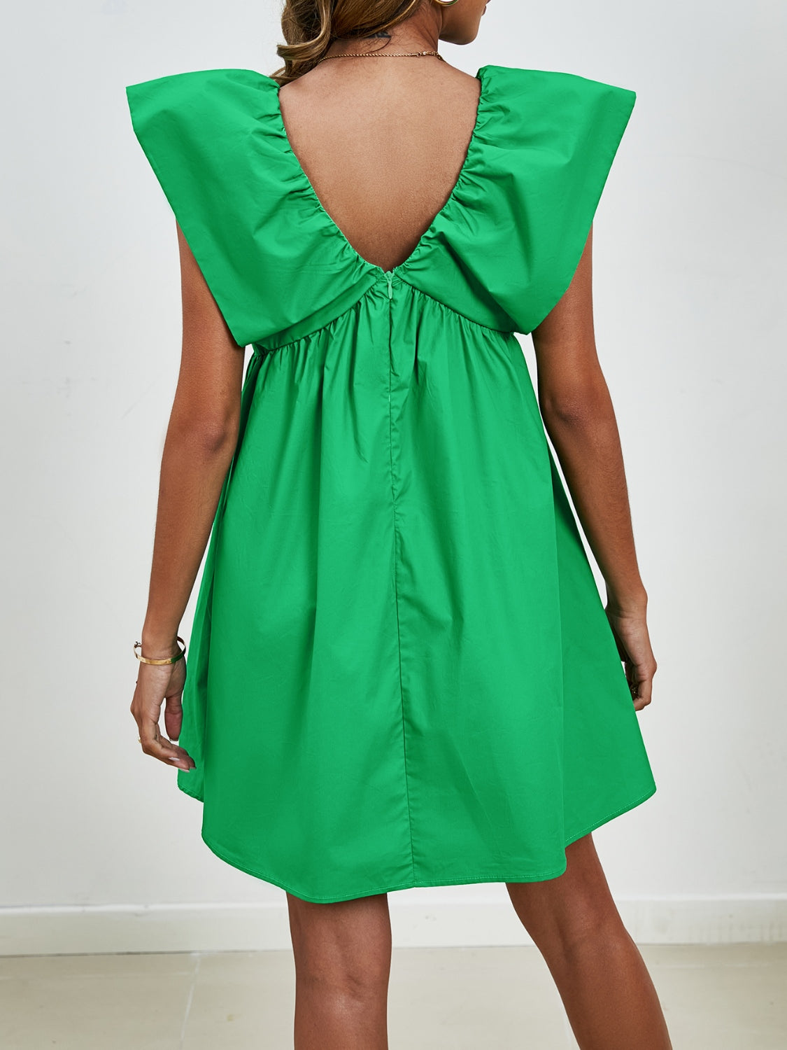 BELLA V-neck cap sleeve mini dress from trendsi, featuring a fitted silhouette and stylish V-neck design, shown on a mannequin.