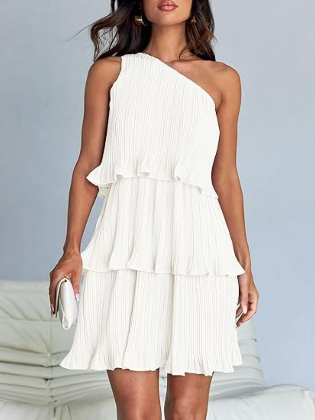 Bella layered single shoulder mini dress from Trendsi, featuring a stylish design with a single shoulder strap and layered detail.