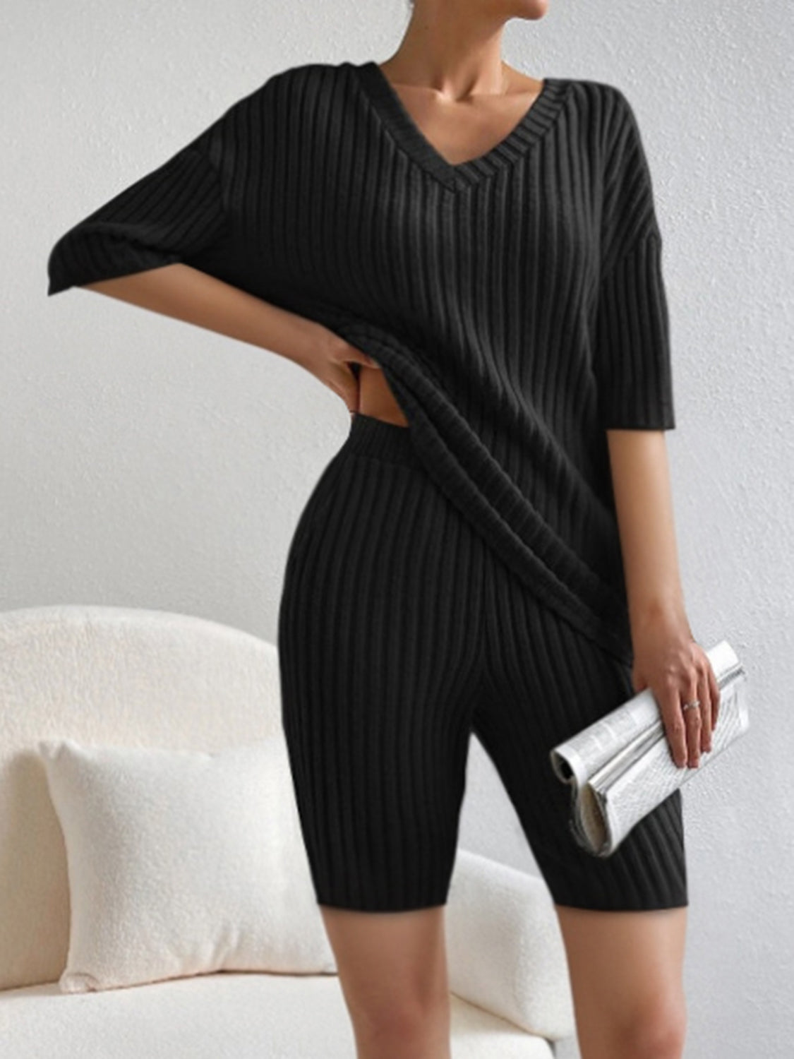 BELLA ribbed V-neck top and matching shorts set from trendsi, featuring a comfortable, stylish two-piece outfit in a coordinated design.