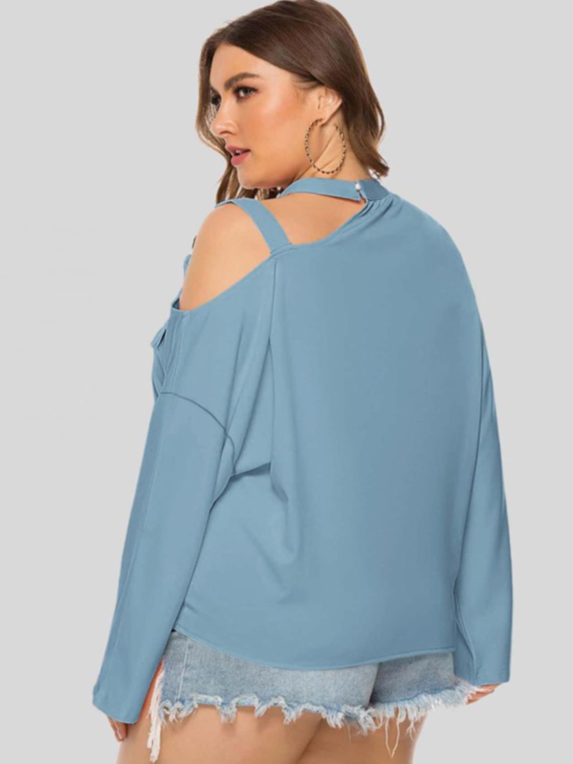 Plus size cold-shoulder tied top by BELLA, trendy fashion top with cut-out shoulders and tie-front design, shown in black.