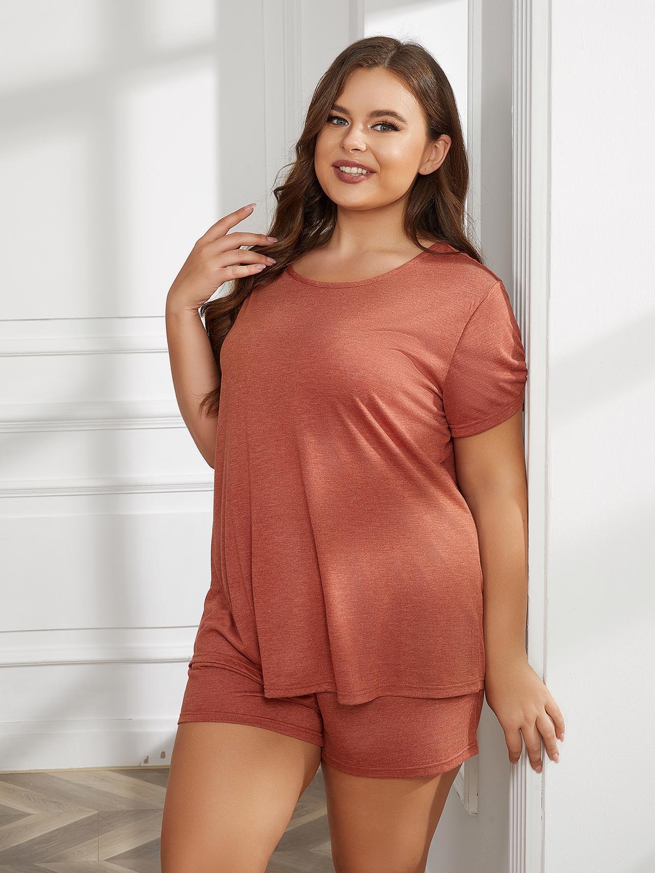 Plus size BELLA two-piece loungewear set featuring a relaxed fit top and matching comfy pants, perfect for cozy home wear.