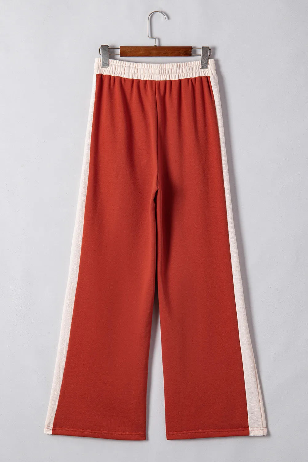 BELLA Trendsi drawstring contrast wide-leg pants with high waist and relaxed fit, shown in a stylish, casual outdoor setting.
