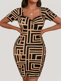 Plus size sweetheart neck short sleeve mini dress by BELLA, featuring a fitted bodice and stylish design, shown on a model.
