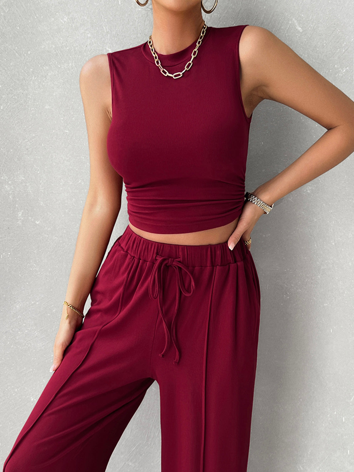 BELLA trendsi mock neck sleeveless top and drawstring pants set, stylish and comfortable ensemble, black fabric, casual fashion look.
