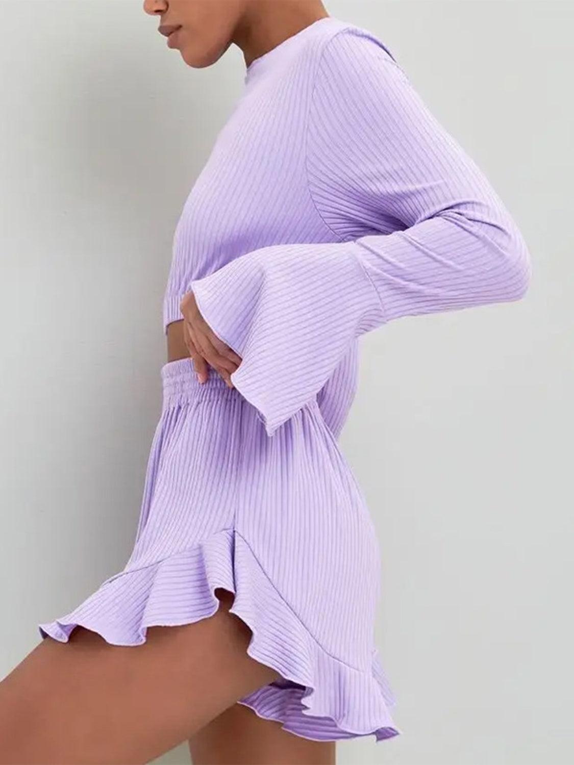 BELLA trendsi round neck long sleeve top with ruffled shorts set, shown in a light fabric with ruffle detailing on the shorts.