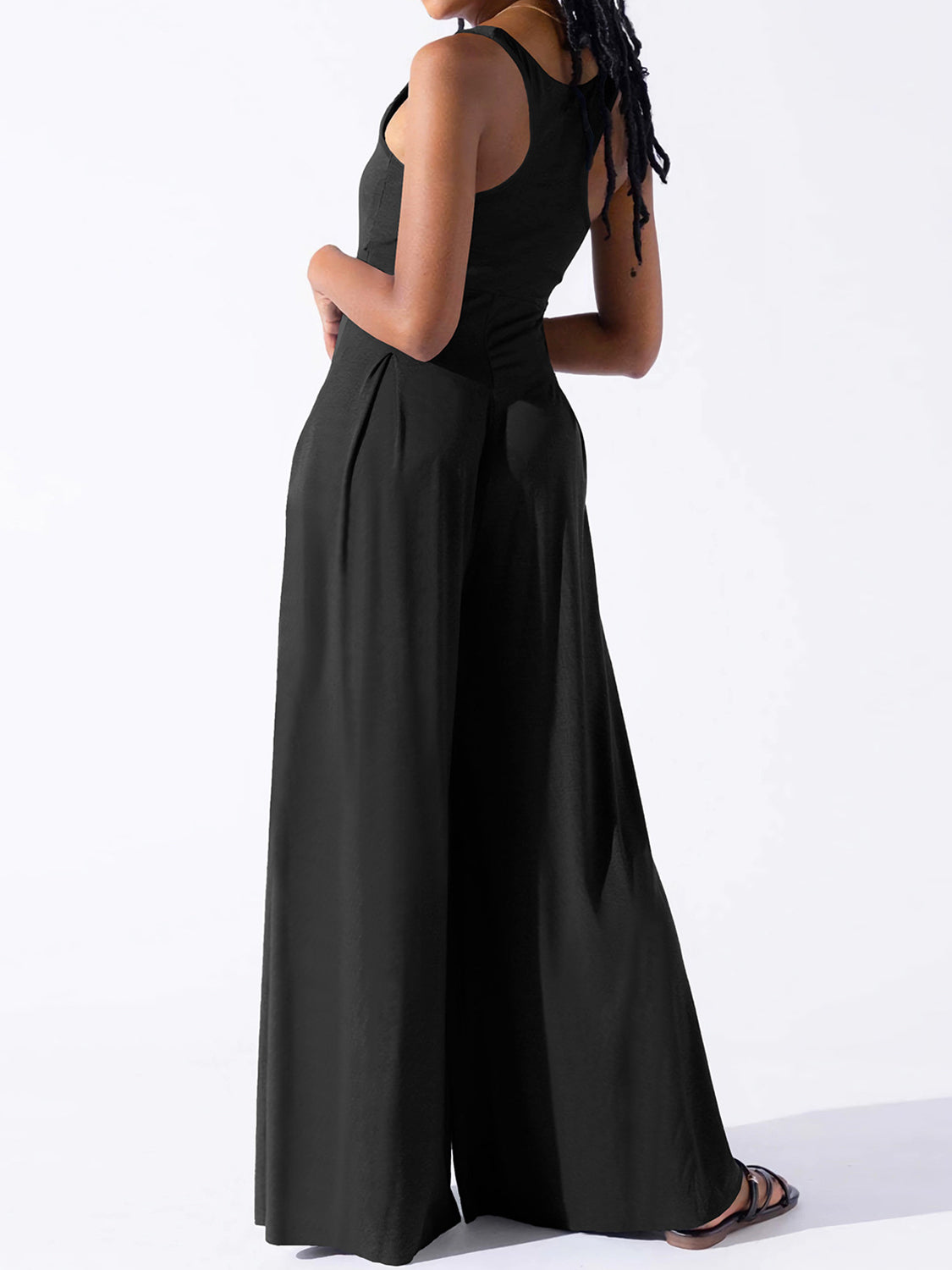 BELLA trendsi square neck wide strap jumpsuit in black, featuring a fitted bodice and wide leg pants, styled for casual wear.