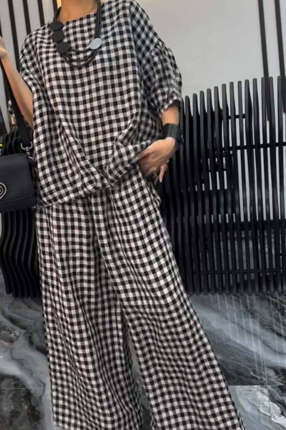 BELLA plaid round neck half sleeve top and matching pants set, featuring a classic pattern and comfortable fit.