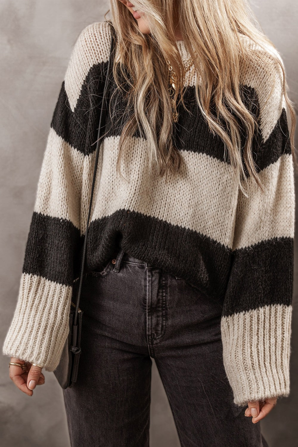 Color block round neck sweater by BELLA BLA, featuring vibrant color blocks and a classic round neckline, displayed on a mannequin.