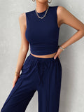 BELLA Trendsi sleeveless mock neck top and drawstring pants set, featuring a stylish sleeveless design and relaxed fit for casual wear.