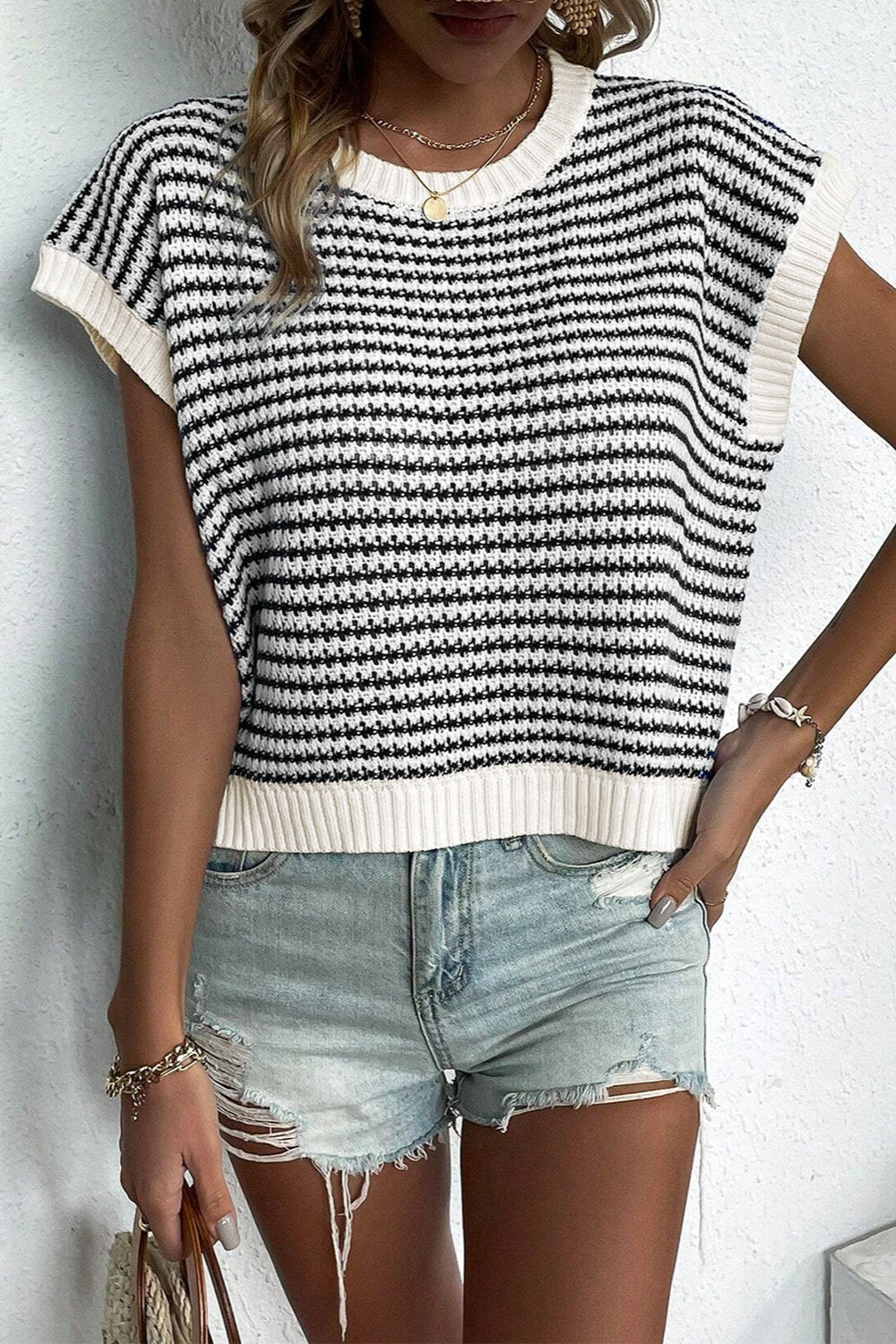 BELLA striped round neck sweater vest from trendsi featuring a cozy knit fabric and multicolor horizontal stripes.