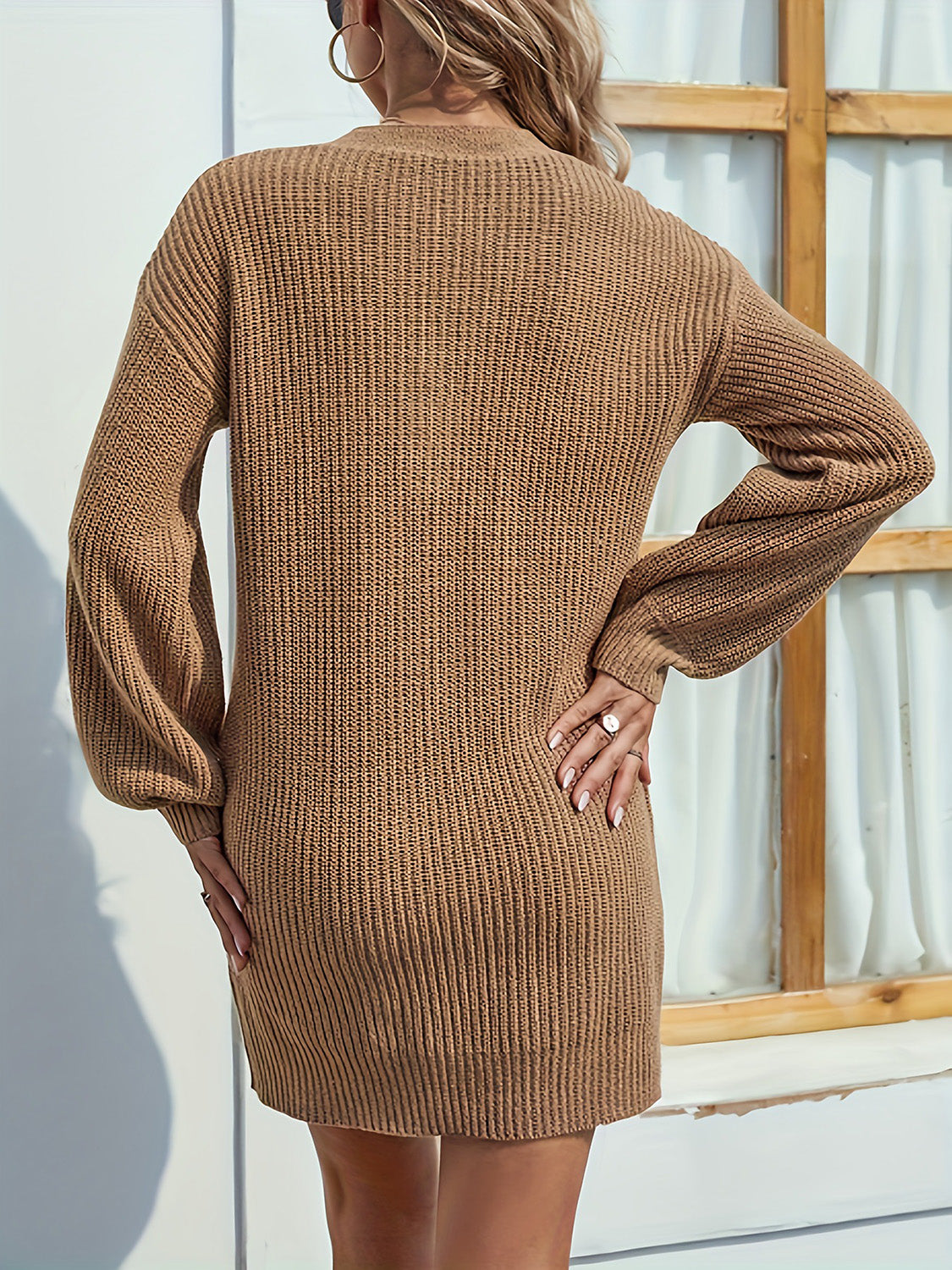 BELLA V-neck dropped shoulder mini sweater dress in soft knit fabric, featuring a relaxed fit and stylish design.