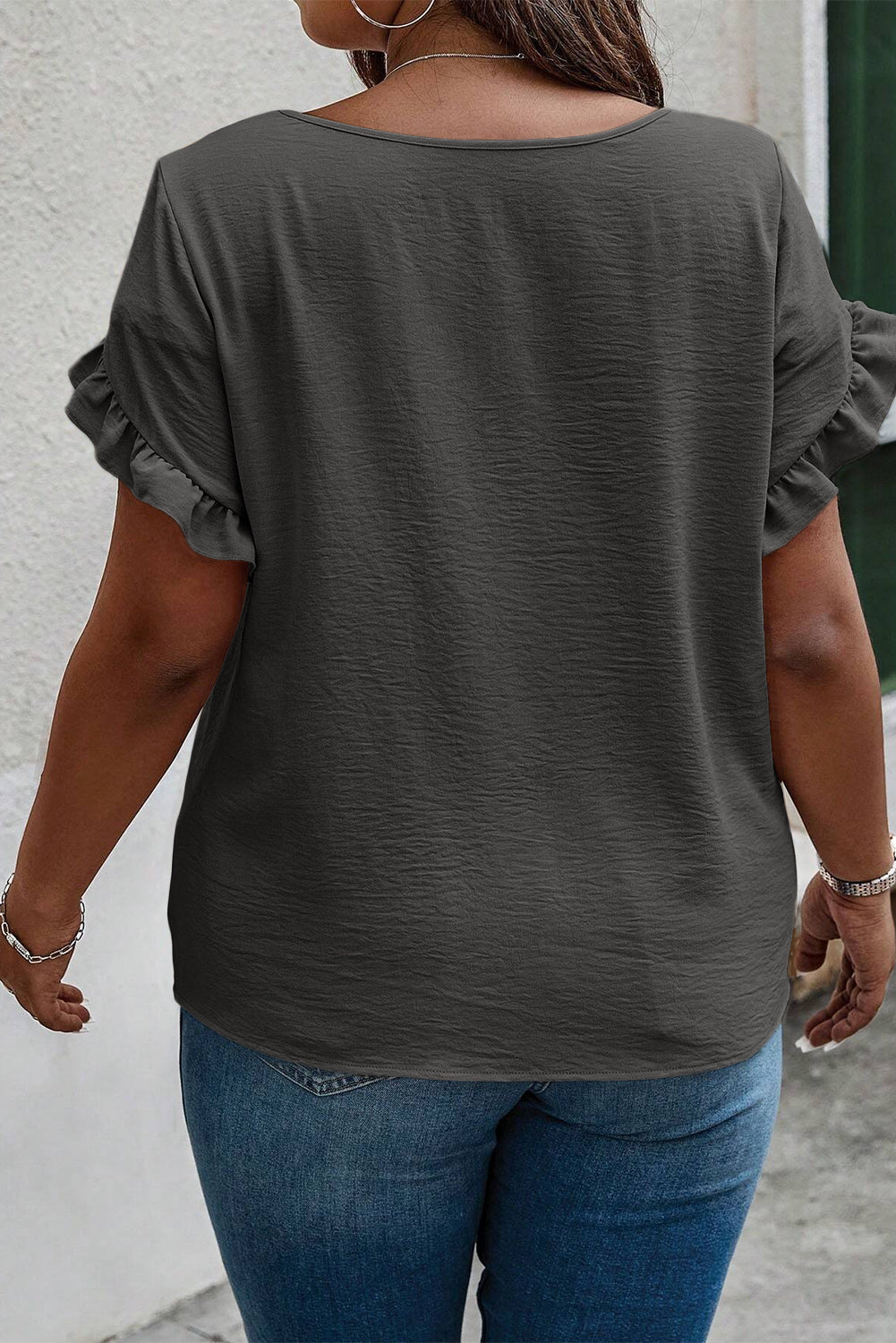 Plus size BELLA ruffled round neck short sleeve blouse, stylish and comfortable with feminine details.