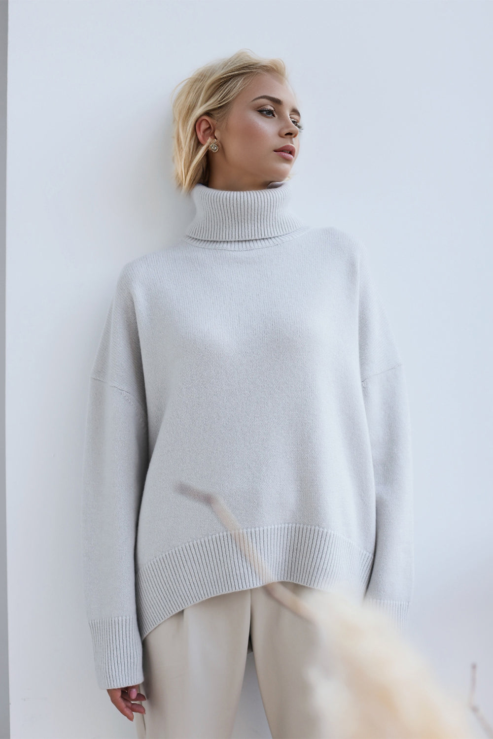BELLA BLA trendsi turtleneck dropped shoulder long sleeve sweater in soft knit, featuring a relaxed fit and stylish design.