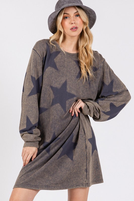 BELLA star print round neck dress from Trendsi featuring a stylish design with a round neckline and star pattern.