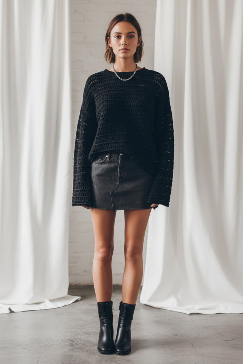 BELLA openwork round neck dropped shoulder knit top featuring a stylish and breathable design with intricate knit pattern.