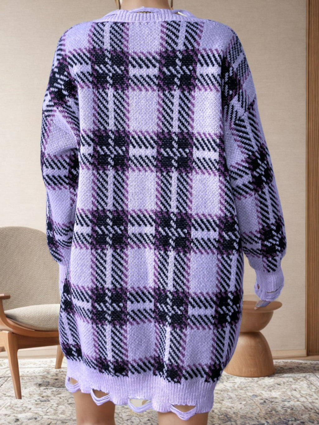 Distressed plaid V-neck long sleeve sweater dress by BELLA BLA featuring a trendy, casual design with a relaxed fit.